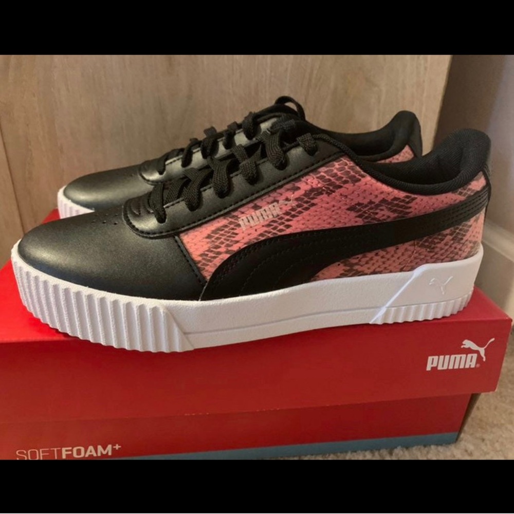 Black and pink pumas